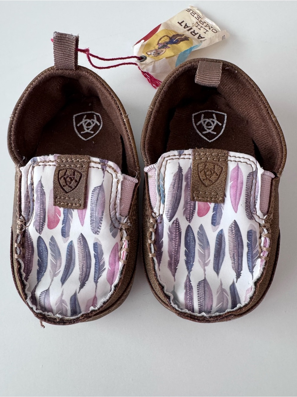 Ariat Baby Brown Moccasin Crib Shoes with Feather-Print